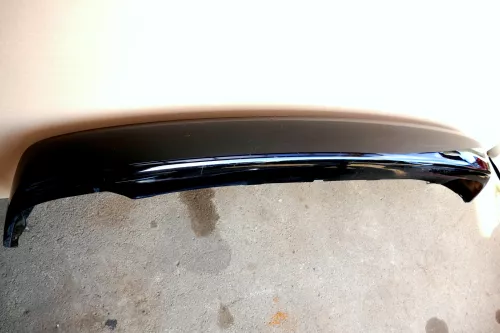 VW Polo 6N Stoßstange hinten Oberteil der 2-geteilte Heckstoßstange schwarz L041 (100309)
