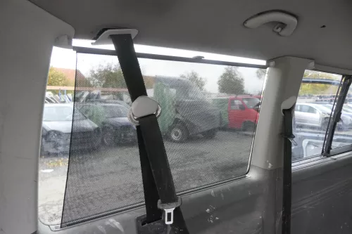 VW T5 Caravelle Rollo Sonnenschutz Sonnenrollo grau ganz hinten links (161100)