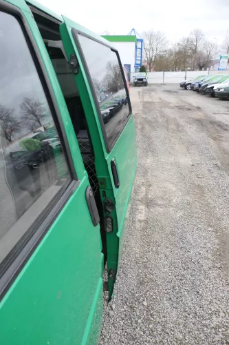 T4 Transporter Tür links Schiebetür mit Scheibe Multivan Caravelle grün Polizei (166175)