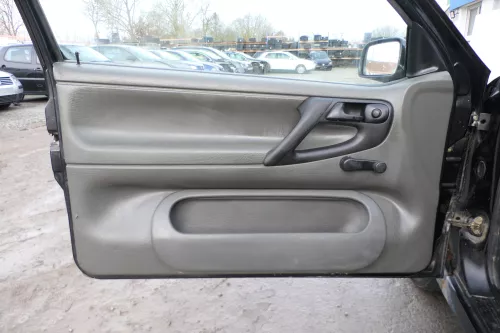 VW Polo 6N Türverkleidung Verkleidung Tür vorne links 2/3-Türer grau Griff Öffne (173423)