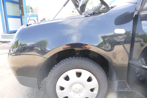 VW Lupo Kotflügel vorne links schwarz L041 vorn - eine kleine Delle (175806)