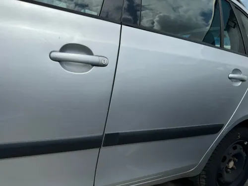 Skoda Fabia 5J Kombi Tür hinten links - silber LA7W - ohne Anbauteile (180757)