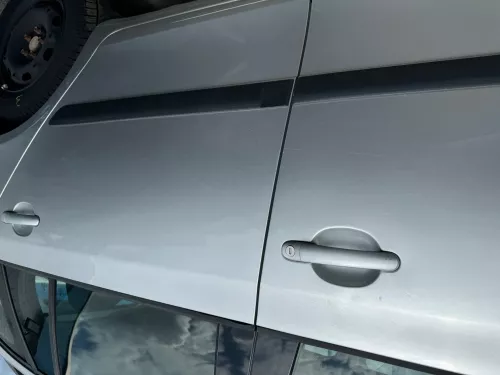 Skoda Fabia 5J Kombi Tür hinten links - silber LA7W - ohne Anbauteile (180757)