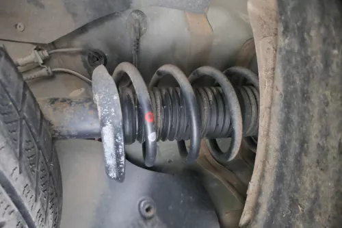 1x VW Eos Golf 5 V Touran Stoßdämpfer Federbein Feder 1T0413031HE vorn