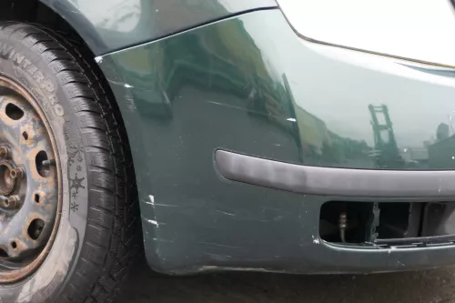 Skoda Fabia 6Y Stoßstange Stoßfänger vorne silber grün LF8C 2000-2004 (184735)
