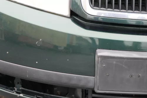 Skoda Fabia 6Y Stoßstange Stoßfänger vorne silber grün LF8C 2000-2004  (184735)